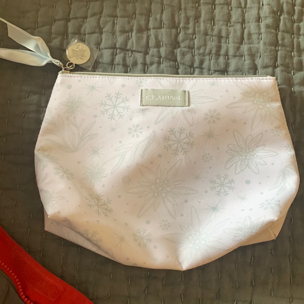 Clarins Makeup Bag never used beautiful winter snowflake and floral designed.